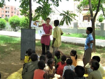 Group of volunteers and Indian staff