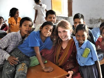 Volunteers and children drawing