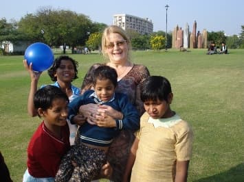 Volunteer playing with street children